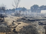 On reaching the spot, fire officials found around 30 to 40 nearby shanties engulfed in flames. “The fire was finally brought under control after an hour,” officials said. (HT Photos)