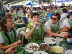Participants enjoy snails during the world's largest snail-eating festival in Spain. (Photo: Amy McConaghy/REUTERS)