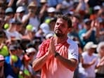 Switzerland's Stan Wawrinka acknowledges the crowd after losing his first round match against Netherlands' Jesper de Jong