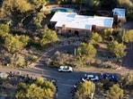 A drone view shows media staging near the home of Nancy Guthrie, the 84-year-old mother of U.S. journalist and television host Savannah Guthrie, who went missing from her home in Tucson.