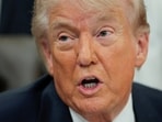 US President Donald Trump speaks during an event to sign a memorandum in the Oval Office at the White House in Washington, D.C.