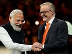 Prime Minister Narendra Modi, left, shakes hands with Australian Prime Minister Anthony Albanese during an Indian community event at Qudos Bank Arena in Sydney, Australia.