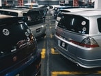Bengaluru’s housing societies struggle with limited parking availability and rising car ownership, the cost of securing an extra parking slot is becoming a growing concern for residents in the city’s large gated communities. (Photo for representational purposes only)