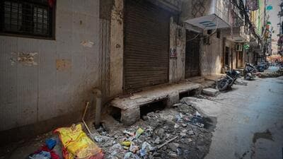 A view of the site in New Ashok Nagar where a 55-year-old daily-wage worker allegedly died within minutes of entering a septic tank on Sunday. (RAJ K RAJ /HT PHOTO) A view of the site in New Ashok Nagar where a 55-year-old daily-wage worker allegedly died within minutes of entering a septic tank on Sunday. (RAJ K RAJ /HT PHOTO)