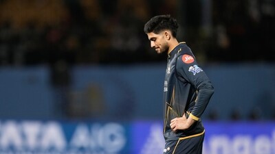 Shubman Gill looks dejected in the field during RCB's onslaught in Dharamshala. (AP Photo) Shubman Gill looks dejected in the field during RCB's onslaught in Dharamshala. (AP Photo)