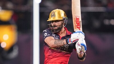But the wicket didn't matter much to Virat Kohli and Devdutt Padikkal. The pair joined forces and continued the onslaught, scoring at a quick rate and making it a very successful powerplay for RCB. The platform was set, as Kohli continued to play in his ultra-attacking avatar despite a few early struggles in this knock. (PTI) But the wicket didn't matter much to Virat Kohli and Devdutt Padikkal. The pair joined forces and continued the onslaught, scoring at a quick rate and making it a very successful powerplay for RCB. The platform was set, as Kohli continued to play in his ultra-attacking avatar despite a few early struggles in this knock. (PTI)