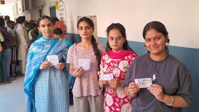 Voters wait for their turn to cast vote at a polling booth no 50 Village Dhakoli Government Primary School during MC election in Zirakpur on Tuesday. (Sant Arora/HT) Voters wait for their turn to cast vote at a polling booth no 50 Village Dhakoli Government Primary School during MC election in Zirakpur on Tuesday. (Sant Arora/HT)
