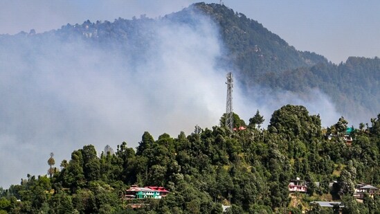 Shimla: Smoke billows after a massive forest fire broke out near Summer Hill, in Shimla, Himachal Pradesh, Tuesday, May 26, 2026. (PTI Photo)(PTI05_26_2026_000195A) (PTI)