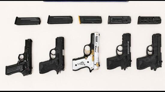 The five .30 bore Glock pistols recovered from weapon supplier Lakhwinder Singh in Ferozepur on Tuesday. (HT Photo)