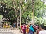 A crowd of undocumented immigrants gathers at the Hakimpur Check Post as they intend to return to Bangladesh, in Basirhat on Tuesday.