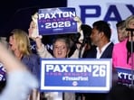 Attendees celebrate after Texas Attorney General Ken Paxton, a Republican candidate for the U.S. Senate, won the Republican party's nomination during a primary runoff election night event in Plano, Texas.