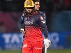Royal Challengers Bengaluru's captain Rajat Patidar, front, with Gujarat Titans' captain Shubman Gill during the IPL 2026 first qualifier match against Gujarat Titans,
