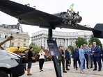 Ukrainian Foreign Minister Andrii Sybiha and Belarusian opposition leader Sviatlana Tsikhanouskaya visit an exhibition displaying destroyed Russian military vehicles, amid Russia's attack on Ukraine, in Kyiv, Ukraine May 25, 2026. REUTERS/Valentyn Ogirenko
