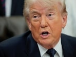 US President Donald Trump speaks during an event to sign a memorandum in the Oval Office at the White House in Washington, DC.