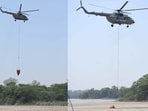 The IAF’s Mi-17 filling Bambi bucket from Sukhna Lake in Chandigarh during efforts to douse fire in forest areas near Kasauli in Himachal Pradesh. 
