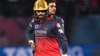 Royal Challengers Bengaluru's captain Rajat Patidar, front, with Gujarat Titans' captain Shubman Gill during the IPL 2026 first qualifier match against Gujarat Titans, (PTI) Royal Challengers Bengaluru's captain Rajat Patidar, front, with Gujarat Titans' captain Shubman Gill during the IPL 2026 first qualifier match against Gujarat Titans, (PTI)