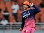 Vaibhav Sooryavanshi shares a light moment during the Indian Premier League cricket match between Rajasthan Royals and Sunrisers Hyderabad in New Chandigarh