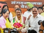 Delhi chief minister Rekha Gupta with newly appointed Delhi BJP president Harsh Malhotra during an event at the BJP party office, in New Delhi on May 28, 2026. (Hindustan Times)