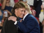 NFL quarterback Jaxson Dart, with the New York Giants, left, hugs President Donald Trump during a Fighting For American Workers event, Friday, May 22, 2026, in Suffern, N.Y. (AP Photo/Ryan Murphy)