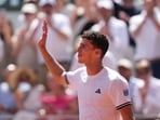 Juan Manuel Cerundolo of Argentina celebrates winning against Jannik Sinner of Italy after their second round men's singles tennis match at the French Open tennis tournament in Paris, Thursday, May 28, 2026. (AP Photo/Thibault Camus)
