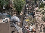 Officials identified multiple vulnerable waterlogging points as overflowing drains and illegal dumping continue across city stretches. (Parveen Kumar/HT)