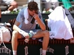 Jannik Sinner in discomfort during his five set loss to Cerundolo on Court Phillipe Chartrier.