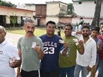 Voters queueing up to exercise their franchise in the panchayat elections at Nahan in Sirmaur district on Thursday. (HT Photo)