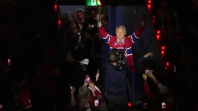 Former Montreal Canadiens player Claude Lemieux holds a torch as he enters the arena before Game 3 of the NHL Eastern Conference final (Christinne Muschi/The Canadian P) Former Montreal Canadiens player Claude Lemieux holds a torch as he enters the arena before Game 3 of the NHL Eastern Conference final (Christinne Muschi/The Canadian P)