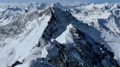 Tyler Andrews, US climber, sets new speed record for reaching the Mt Everest peak with the support of supplementary oxygen on Thursday (May 28) (AFP) Tyler Andrews, US climber, sets new speed record for reaching the Mt Everest peak with the support of supplementary oxygen on Thursday (May 28) (AFP)