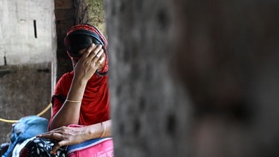 হাকিমপুর সীমান্তে এক বাংলাদেশি অনুপ্রবেশকারী। (ছবি সৌজন্যে এএফপি) হাকিমপুর সীমান্তে এক বাংলাদেশি অনুপ্রবেশকারী। (ছবি সৌজন্যে এএফপি)