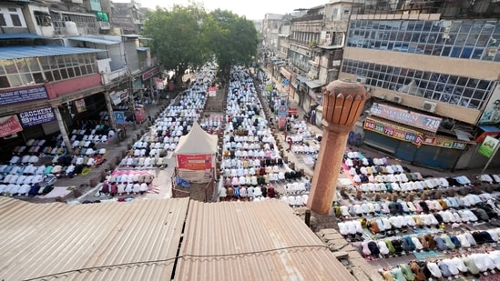 People offer Eid al-Adha prayers outside Fatehpuri Masjid, in New Delhi. (PTI)