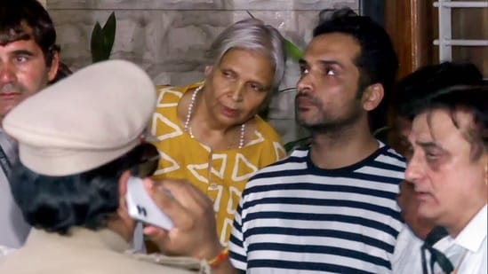 Twisha's husband and accused Samarth Singh (in striped T-shirt on left) and mother-in-law Giribala Singh in Bhopal on Wednesday. (ANI video grab)