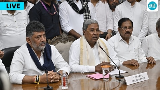Karnataka CM news: Outgoing chief minister Siddaramaiah addresses a press conference with deputy chief minister DK Shivakumar after tendering his resignation