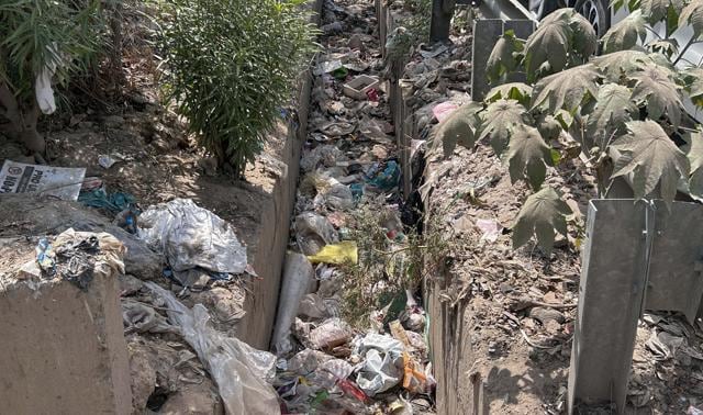 Silted stormwater drain along near Hero Honda Chowk, as seen on Wednesday. (Parveen Kumar/HT) Silted stormwater drain along near Hero Honda Chowk, as seen on Wednesday. (Parveen Kumar/HT)