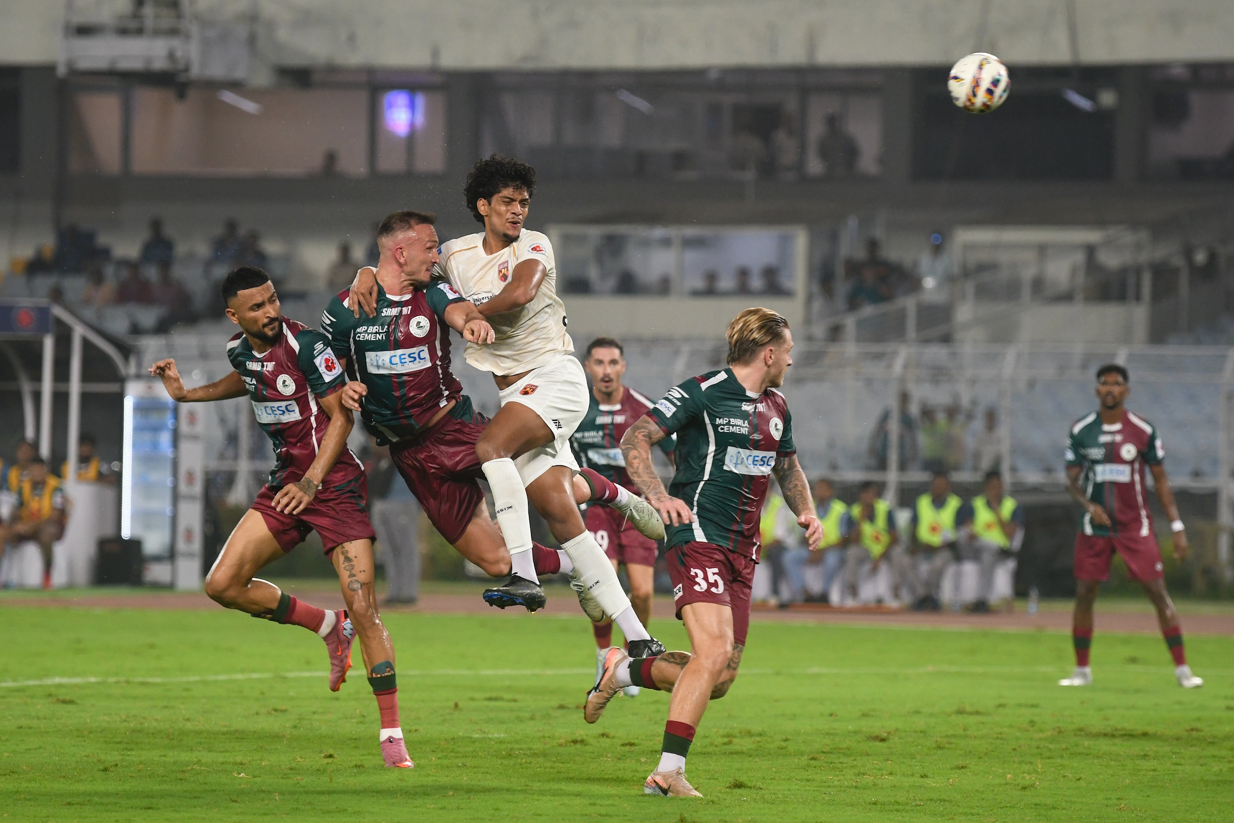 Manvir Singh (extreme left) and Liston Colaco (right), in action here during the Mohun Bagan-Sporting Club ISL12 match in Kolkata last week, were among those called up for the tour of England. (AIFF) Manvir Singh (extreme left) and Liston Colaco (right), in action here during the Mohun Bagan-Sporting Club ISL12 match in Kolkata last week, were among those called up for the tour of England. (AIFF)