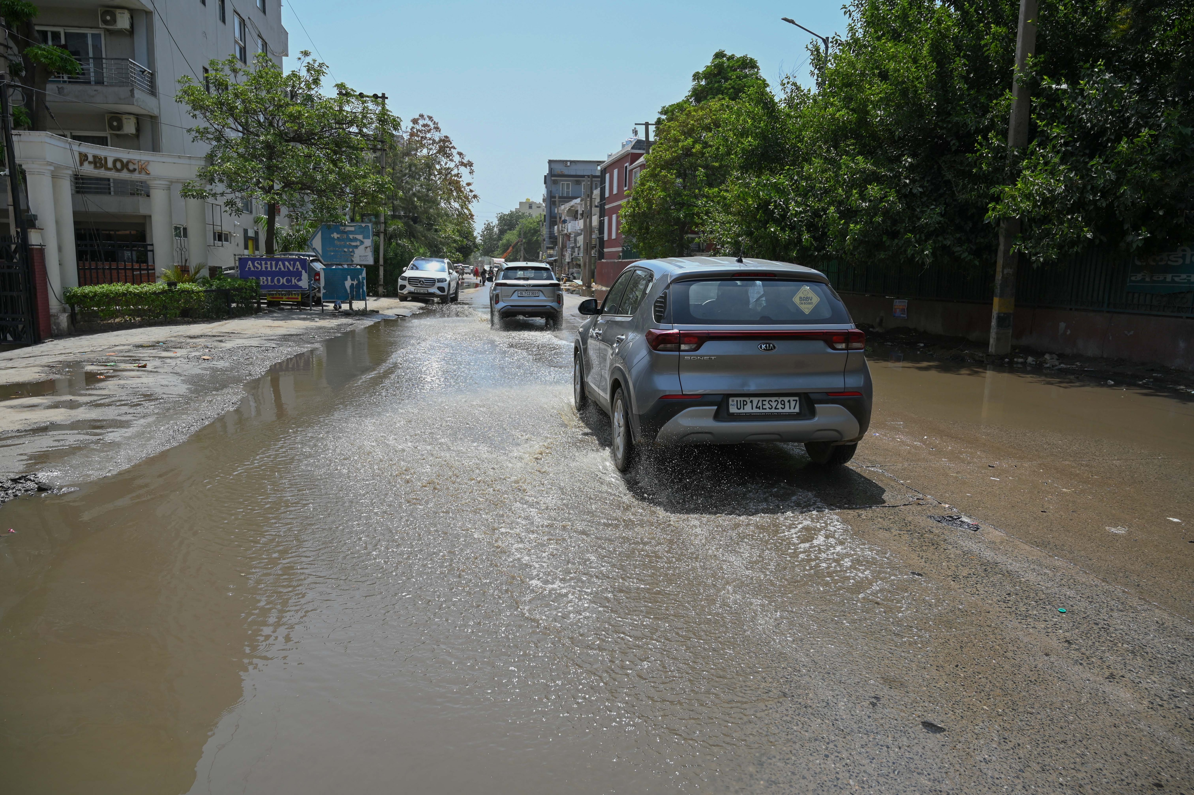 A flooded stretch on the main road in Sector 48, near Shri Shiv Shakti Mandir, as seen on Wednesday. (Parveen Kumar/HT)