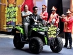 Varun Dhawan rides with filmmaker David Dhawan during the trailer launch of their film Hai Jawani Toh Ishq Hona Hai, in Mumbai on Saturday. (ANI Photo)