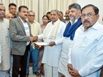 Karnataka CM news LIVE: Karnataka chief minister Siddaramaiah submits his resignation from the post of chief minister to the secretary of state Governor, Thaawarchand Gehlot, in Bengaluru on Thursday. deputy CM DK Shivakumar and others also present.