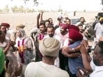 AAP supporters celebrate the party's lead in the Punjab civic body polls, in Amritsar on Friday.