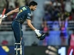 Gujarat Titans' captain Shubman Gill celebrates after scoring a century against Rajasthan Royals. (AFP)