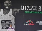 Kenyan marathon record-breaker Sabastian Sawe (left) delivers a speech in Nairobi. (AP)