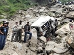 Local residents at the mishap site in Kullu on Thursday.