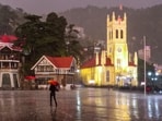 Shimla: People walk during rain at the Ridge, in Shimla, Himachal Pradesh, Friday, May 29, 2026. 
