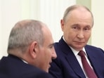 Russian President Vladimir Putin and Armenian PM Nikol Pashinyan attend a meeting at the Kremlin in Moscow in April 2026. 
