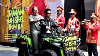 Varun Dhawan rides with filmmaker David Dhawan during the trailer launch of their film Hai Jawani Toh Ishq Hona Hai, in Mumbai on Saturday. (ANI Photo) (girish srivastav) Varun Dhawan rides with filmmaker David Dhawan during the trailer launch of their film Hai Jawani Toh Ishq Hona Hai, in Mumbai on Saturday. (ANI Photo) (girish srivastav)