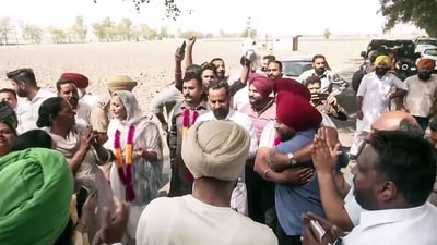 AAP supporters celebrate the party's lead in the Punjab civic body polls, in Amritsar on Friday. (ANI Video Grab) AAP supporters celebrate the party's lead in the Punjab civic body polls, in Amritsar on Friday. (ANI Video Grab)