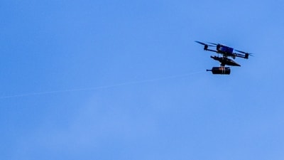 A first-person-view drone guided by fiber optic cable flying over the border from Lebanon recently, as seen from the Israeli side of the border. A first-person-view drone guided by fiber optic cable flying over the border from Lebanon recently, as seen from the Israeli side of the border.