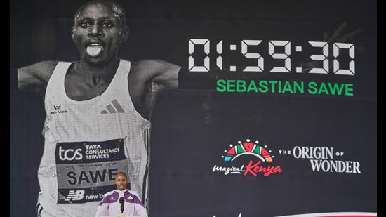 Kenyan marathon record-breaker Sabastian Sawe (left) delivers a speech in Nairobi. (AP)