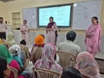 A parent-teacher meeting and interactive session underway at a government school in Mansa. (HT) A parent-teacher meeting and interactive session underway at a government school in Mansa. (HT)