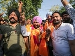 Aam Aadmi Party's candidate from Majitha's Ward No. 3, Amarjit Singh, celebrates his win in the Punjab civic body elections, in Amritsar. (ANI Photo/Raminder Pal Singh)